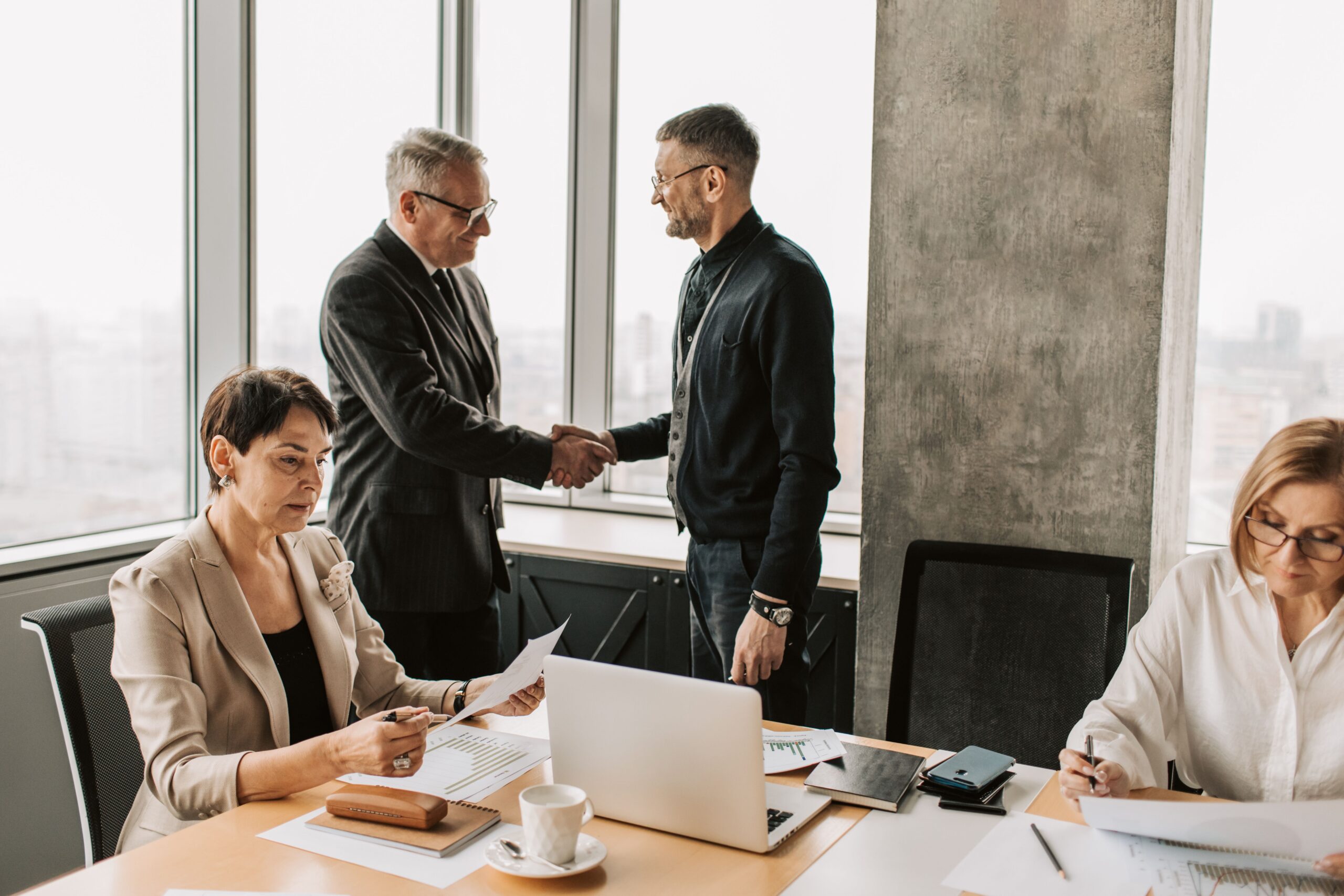 Men Doing Hand Shake Stockpack Pexels Management buyout finance can be used to fund mergers and acquisitions